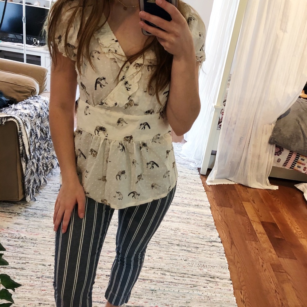 Anthropologie peplum top raccoon pattern